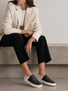 CHANEL Black and White Leather Slip-On Sneakers